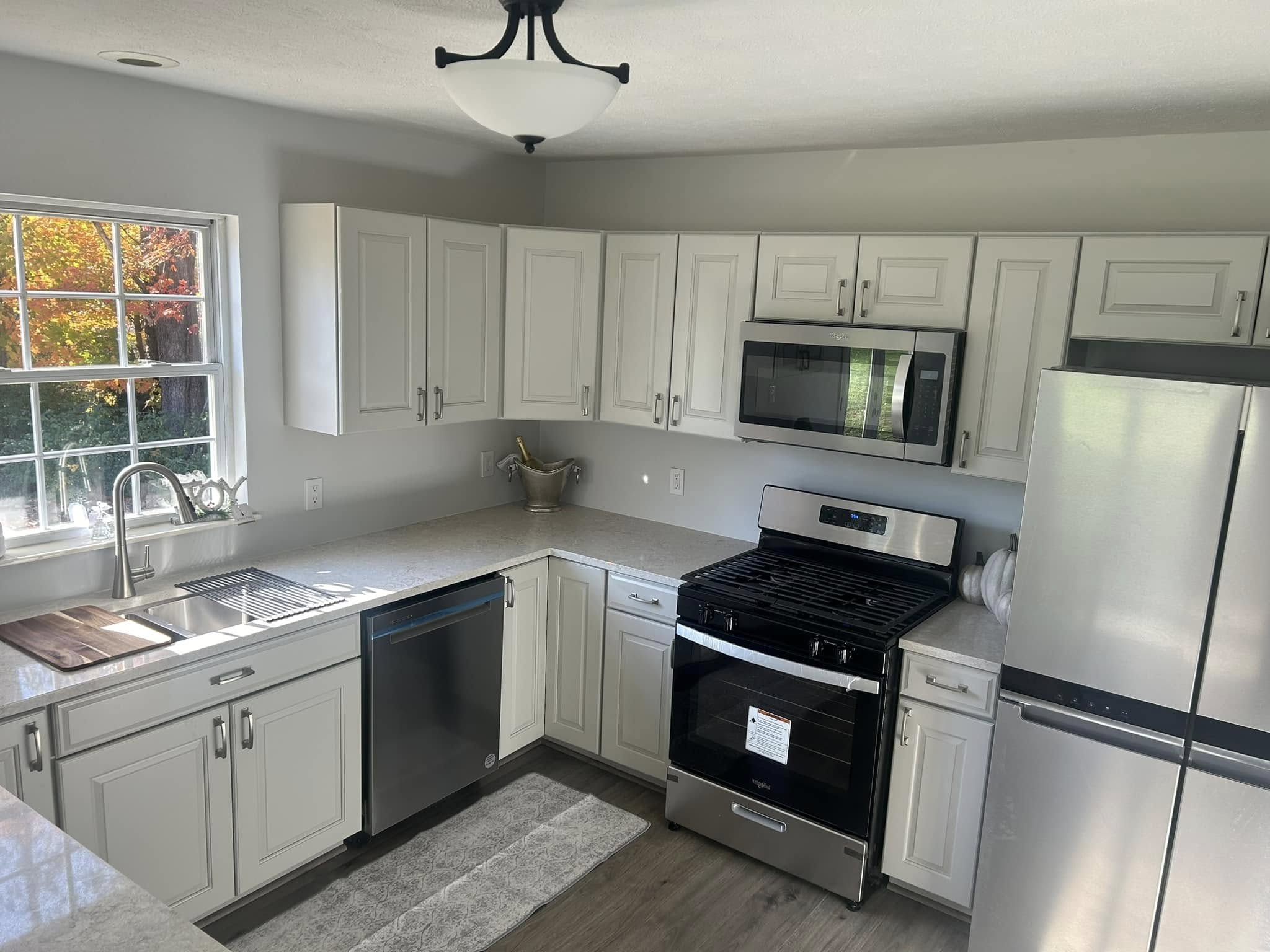 kitchen with white wood cabinets